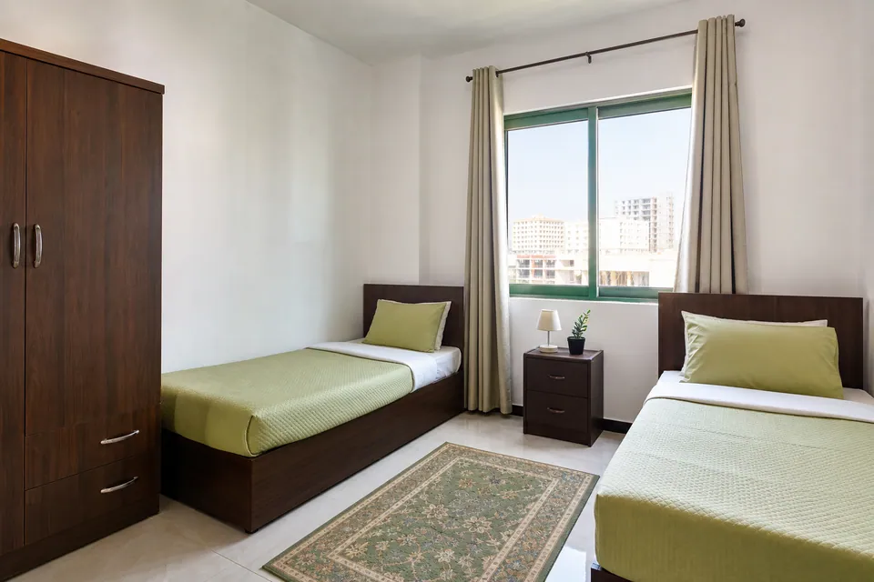 Sample shared room with two single beds
